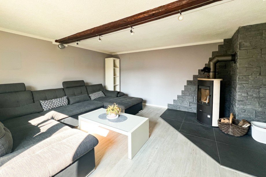 Wohnzimmer mit Kamin Einfamilienhaus Erfurt / Bindersleben