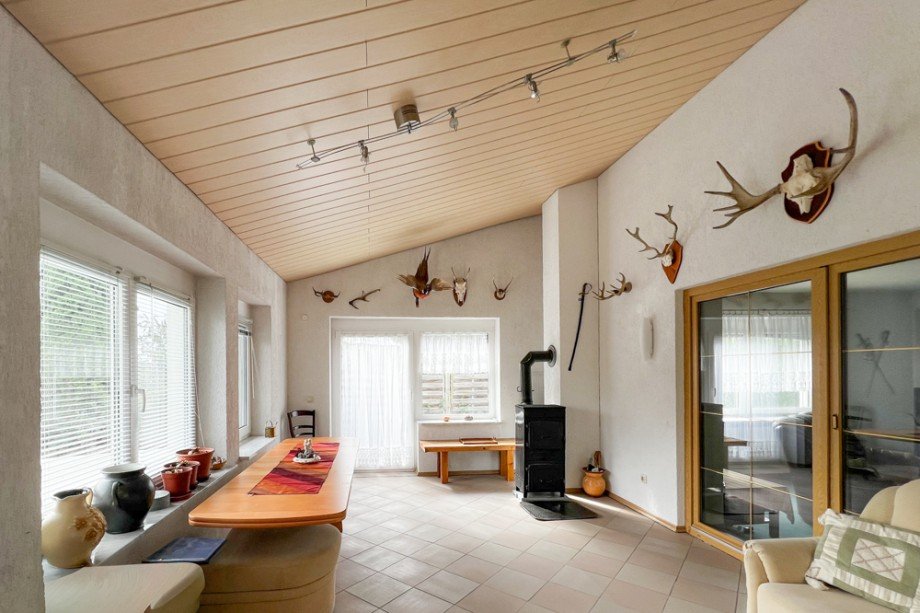 Wintergarten mit Fu�bodenheizung und Kamin Einfamilienhaus Erfurt / Niedernissa